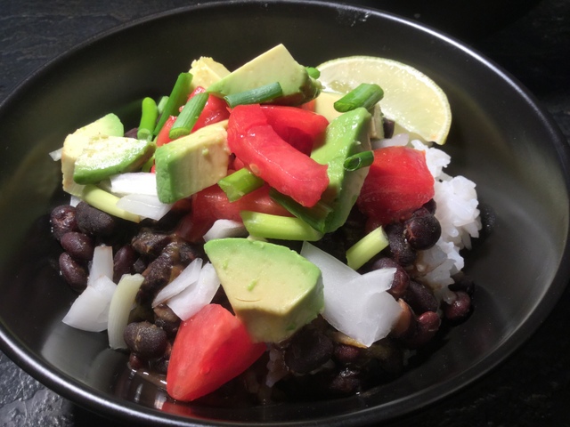 Black beans and rice with avocado, tomatoes and sweet onions make a great 