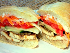 Vietnamese Style Sandwich made with tofu and fresh vegetables on crusty bread.