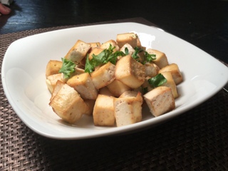 Oven roasted tofu is a tasty meat substitute to add to all your vegetable dishes!