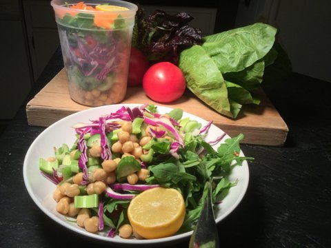 This salad "to go"lunch includes lots of different textures and tastes including garbanzo beans. After this meal, you won't be hungry.