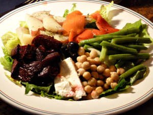 A variety of vegetables on the dinner plate become a delicious meal.